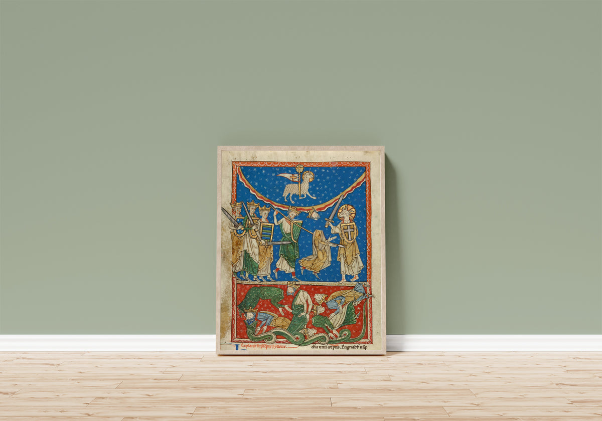 Framed art print of Beatus Manuscript: The Lamb Defeating the Ten Kings, in a light wood frame leaning on a sage green wall above a wooden floor