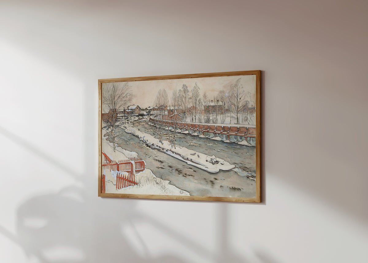 Framed art print of The Timber Chute. Winterscene by Carl Larsson, in a light wood frame on a sunlit white wall, seen at a slight angle