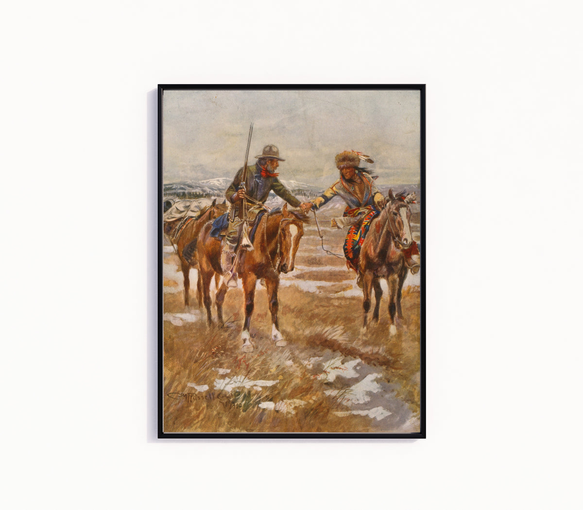 Framed art print of The Meeting by Charles M. Russell, in a slim black frame on a plain white wall