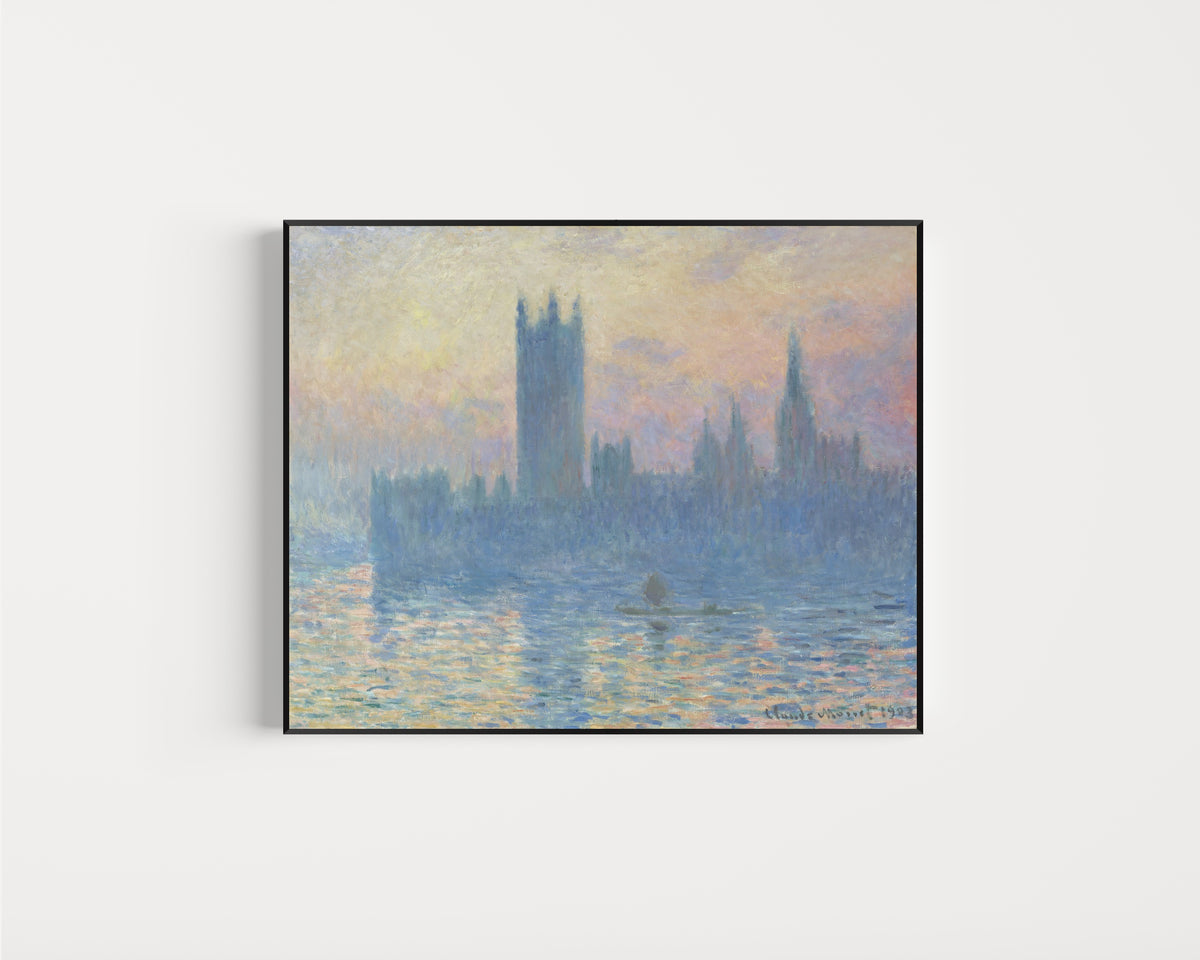 Framed art print of Houses of Parliament at Sunset by Claude Monet, in a slim black frame on a plain white wall