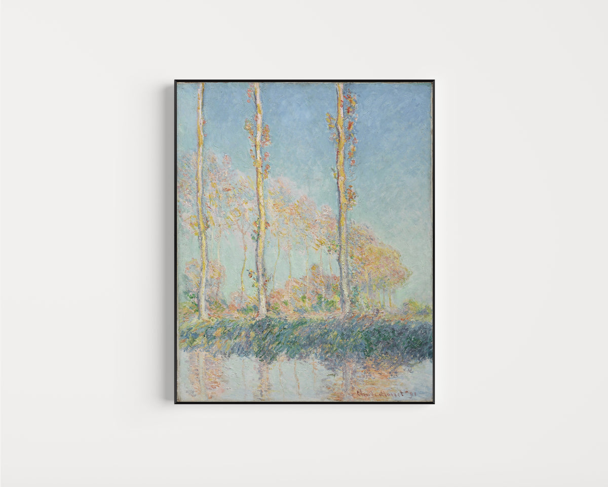 Framed art print of Poplars (Four Trees) by Claude Monet, in a slim black frame on a plain white wall