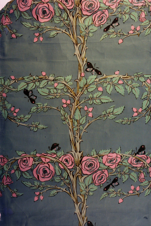 Rose and Tree by Arthur Heygate Mackmurdo — A rose tree climbs a trellis with butterflies