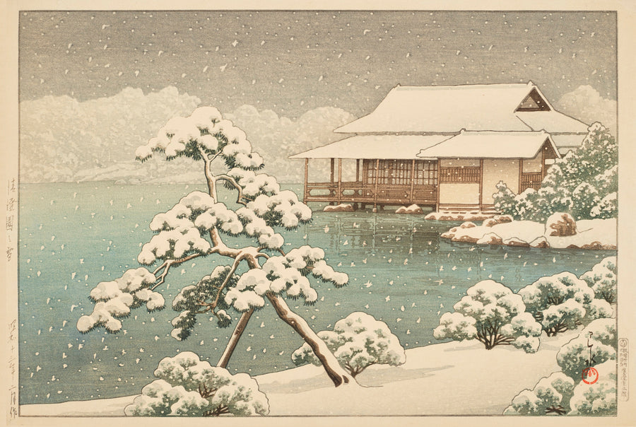 Kawase Hasui — Snow at Kiyosumi Garden | Japanese Woodblock Print (Shin Hanga) shown to scale on a wall above a sofa