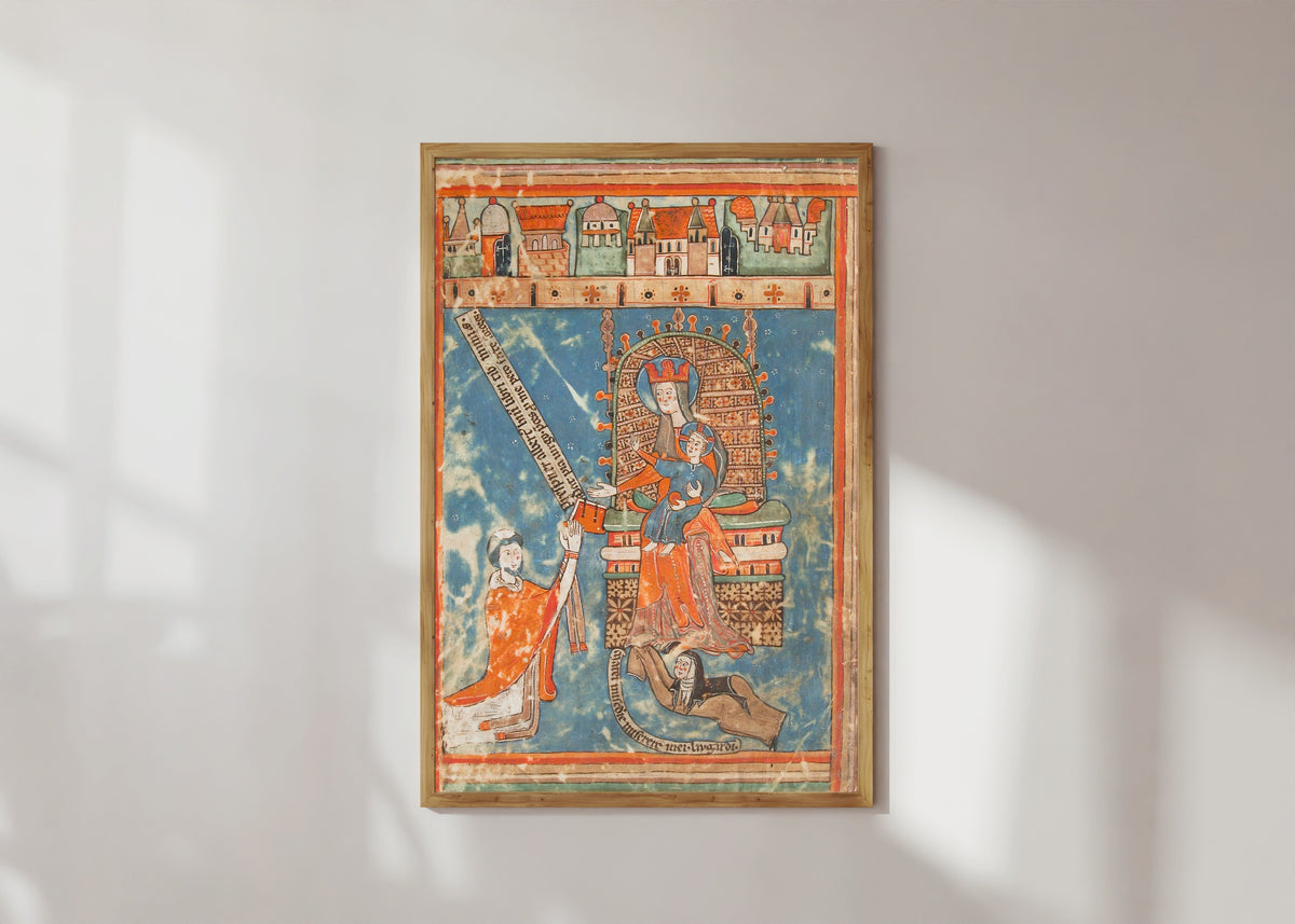 Framed art print of Dedication of a Book to the Virgin, in a light wood frame on a sunlit white wall