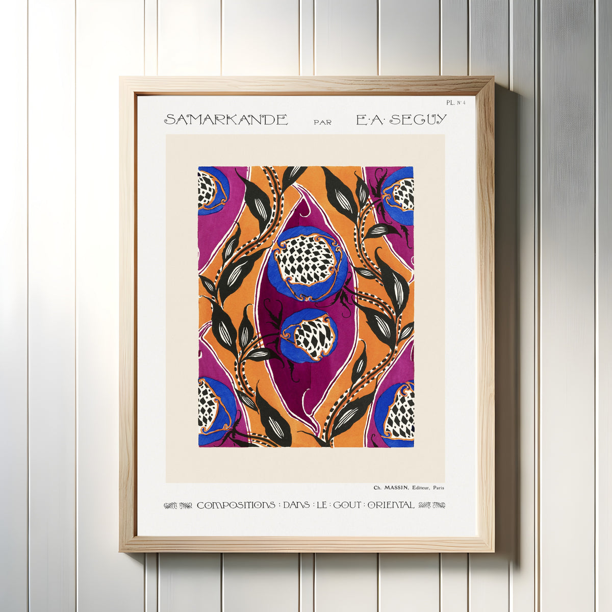 Framed art print of Samarkande, Plate 4 by E. A. Séguy, in a light wood frame on a white panelled wall