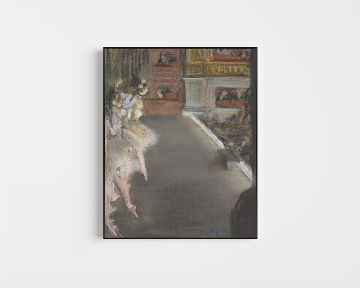 Framed art print of Dancers at the Old Opera House by Edgar Degas, in a slim black frame on a plain white wall