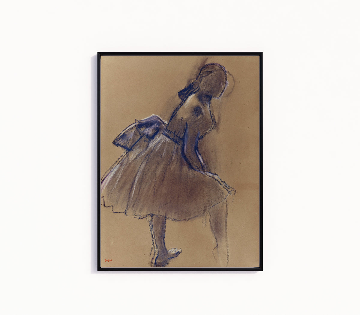 Framed art print of Danseuse debout, de profil by Edgar Degas, in a slim black frame on a plain white wall