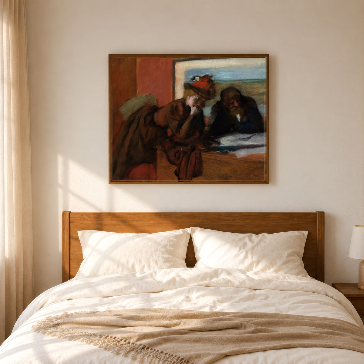 Framed art print of The Conversation by Edgar Degas, in a slim wood frame above a bed in a sunlit bedroom