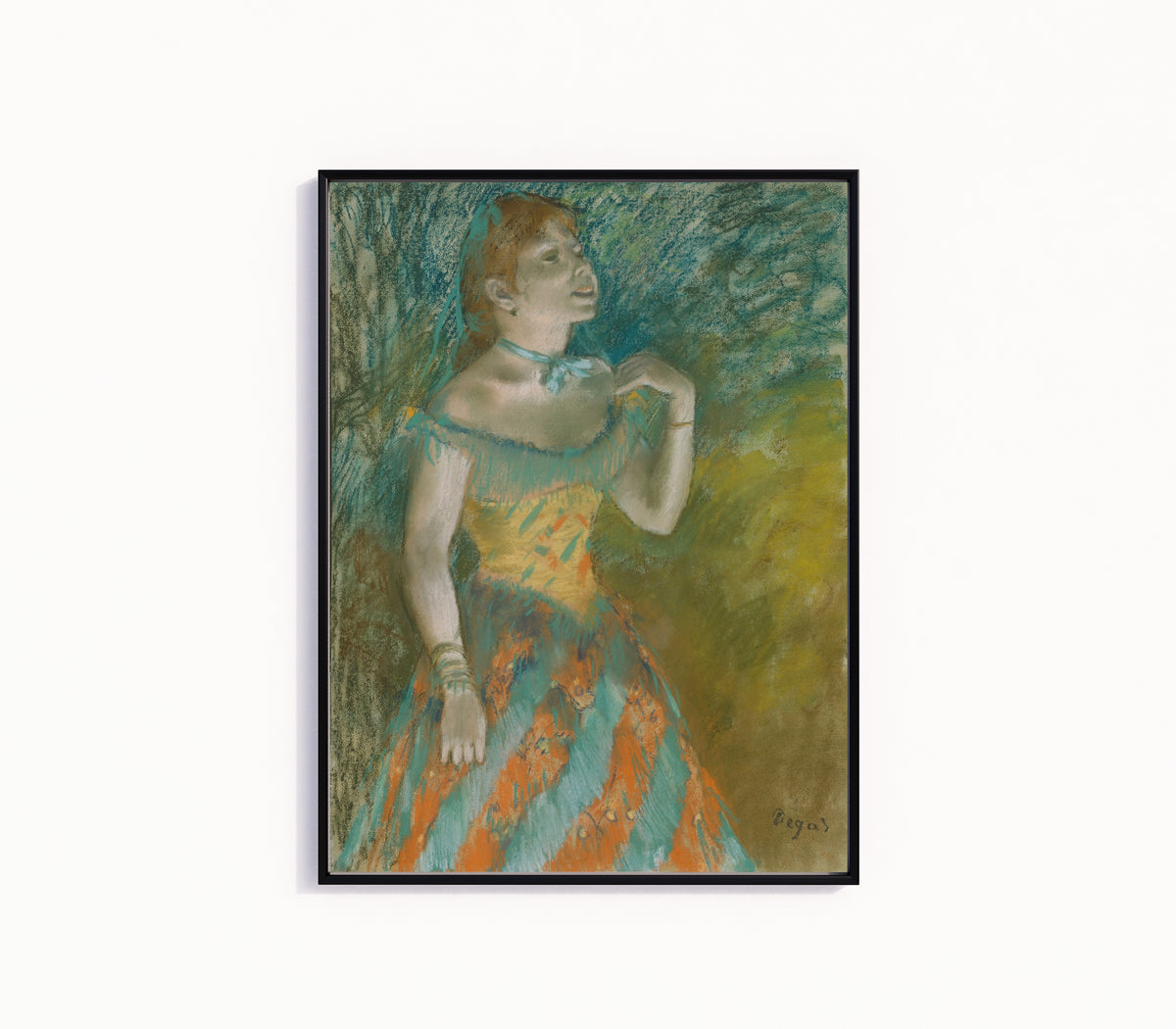 Framed art print of The Singer in Green by Edgar Degas, in a slim black frame on a plain white wall