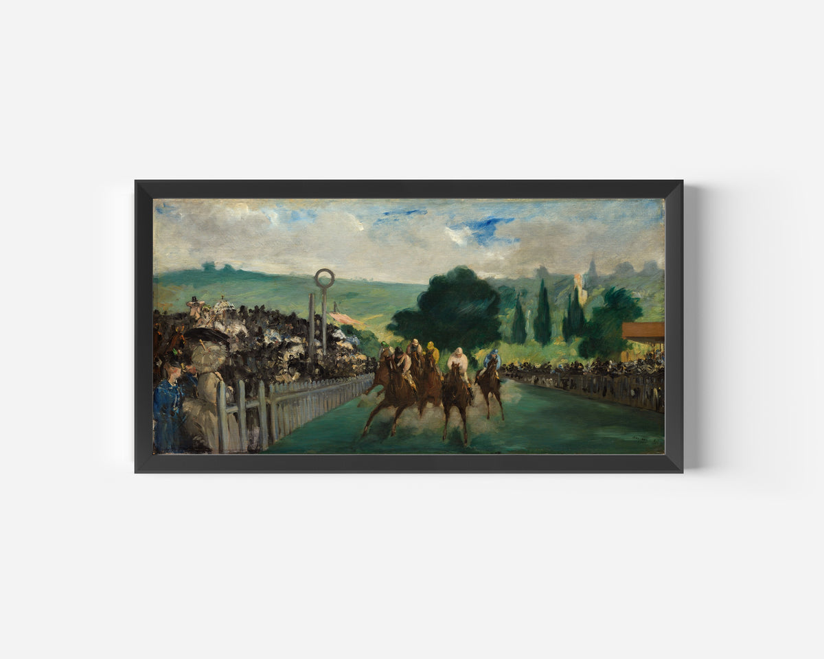 The Races at Longchamp by Édouard Manet — in a wide black frame on a plain white wall
