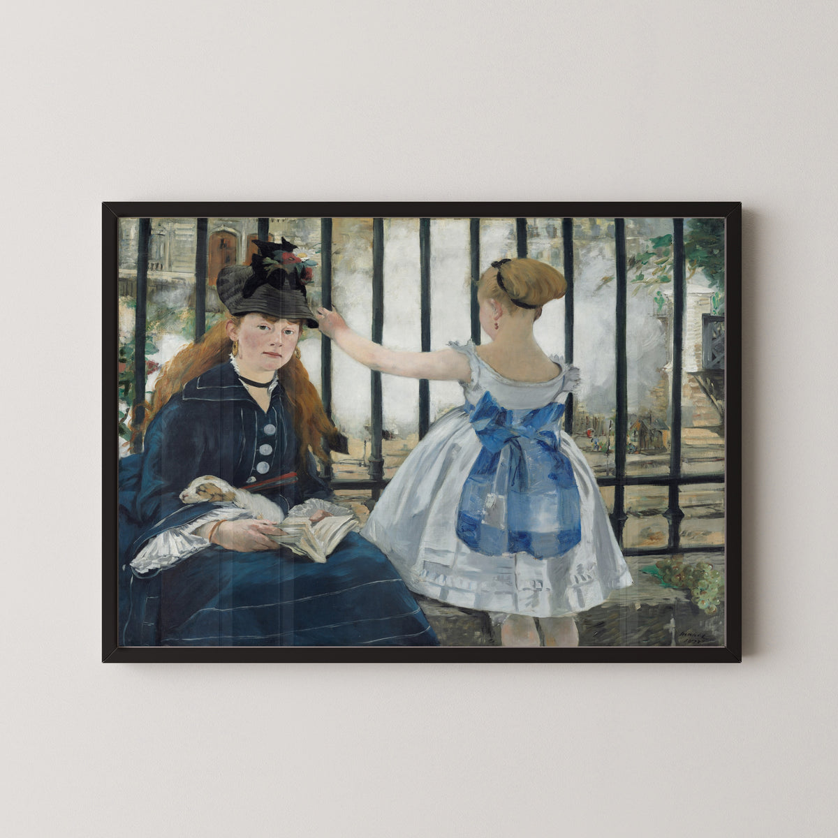 The Railway by Édouard Manet — in a black frame on a pale wall