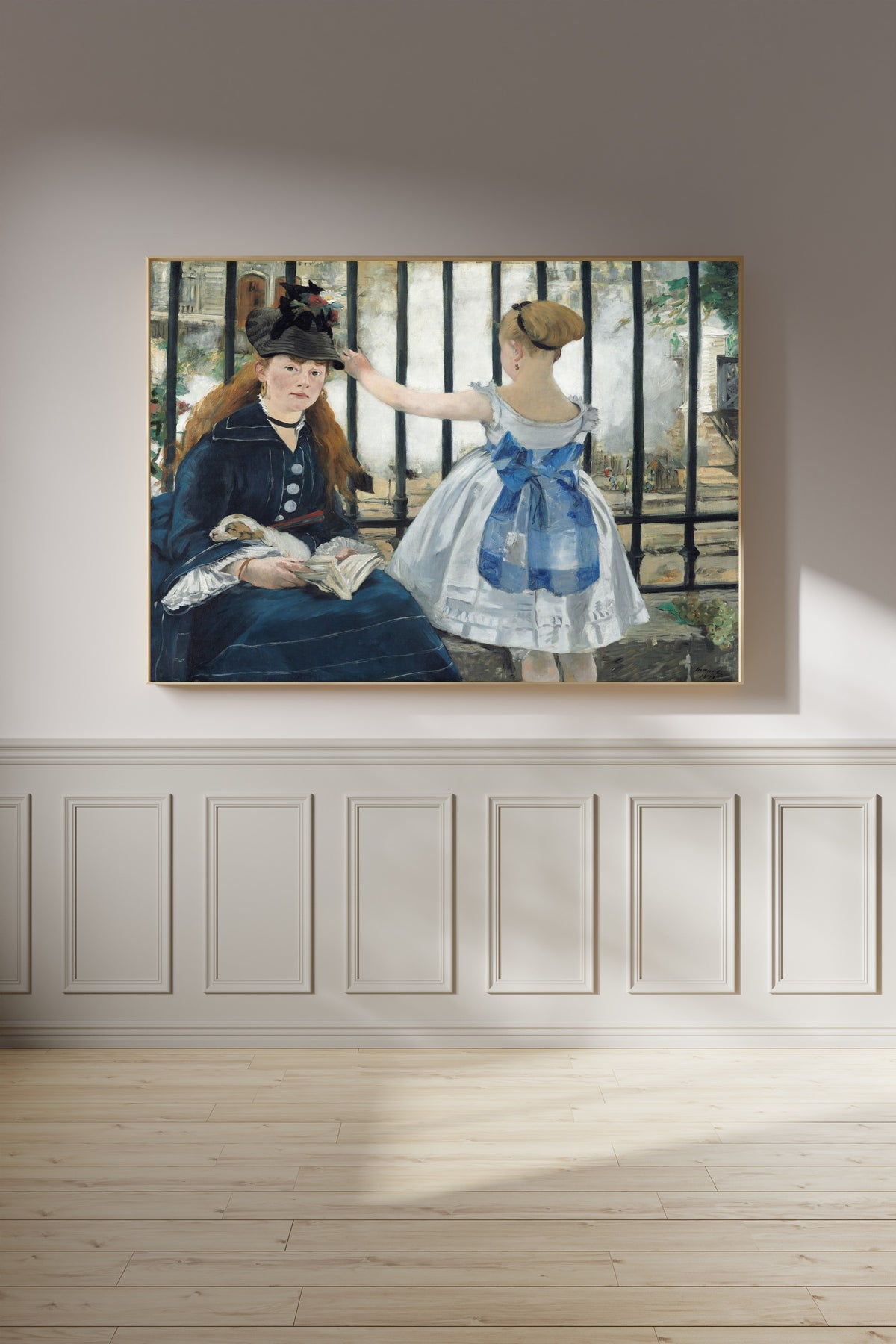 The Railway by Édouard Manet — framed on a panelled wall in afternoon light