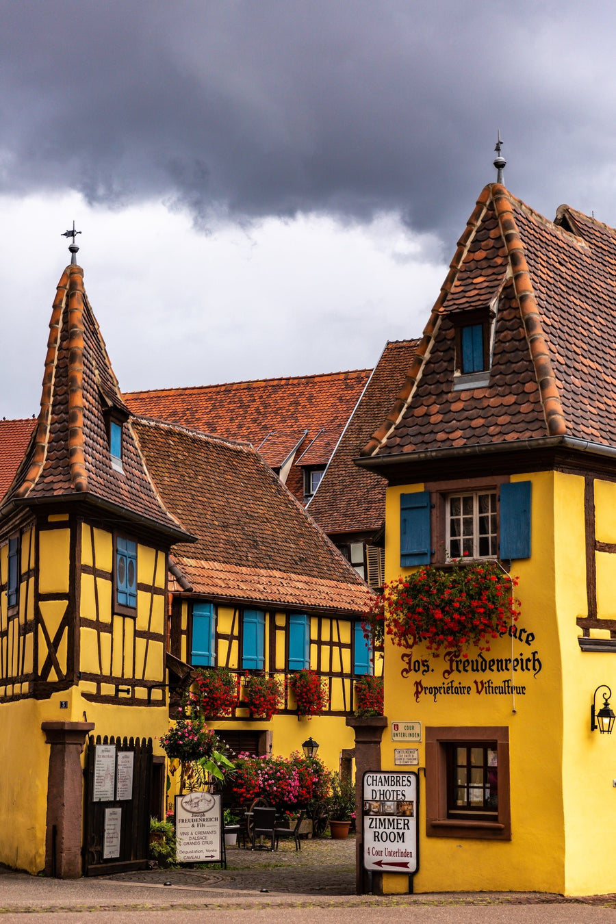 Daniela Faust — Eguisheim, Alsace | Fine Art Photography Print shown to scale on a wall above a sofa