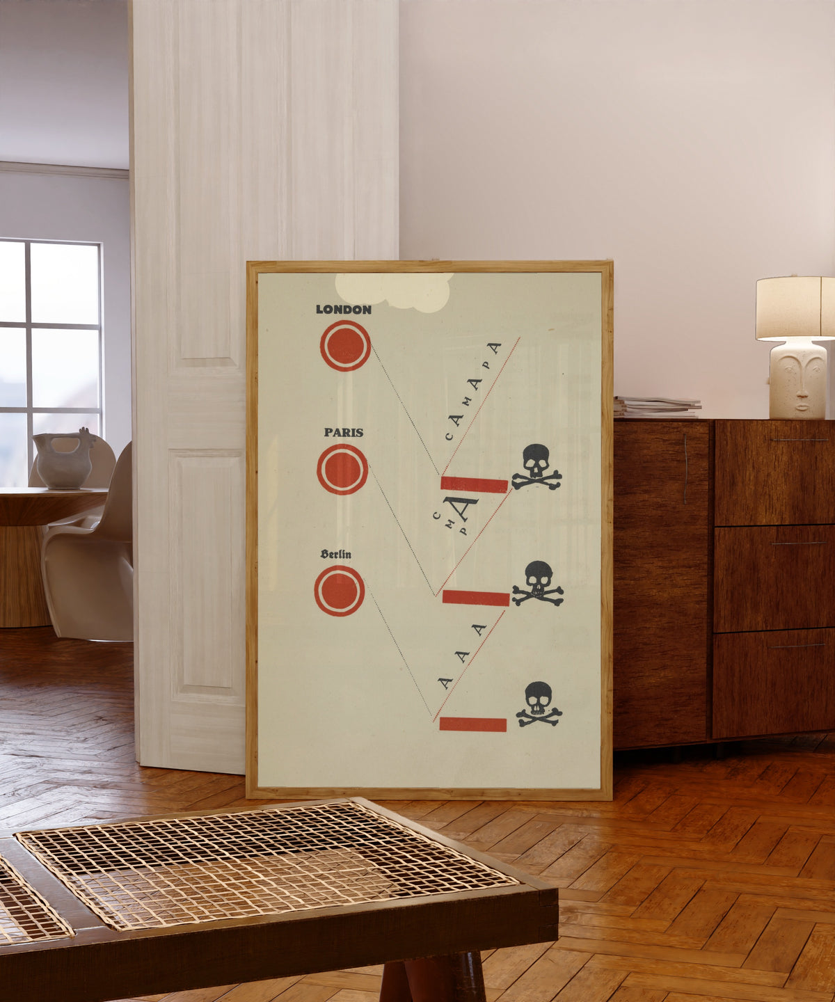 Framed art print of For the Voice: Bastards! (London, Paris, Berlin) by El Lissitzky, in a light wood frame leaning in a warm room with a parquet floor