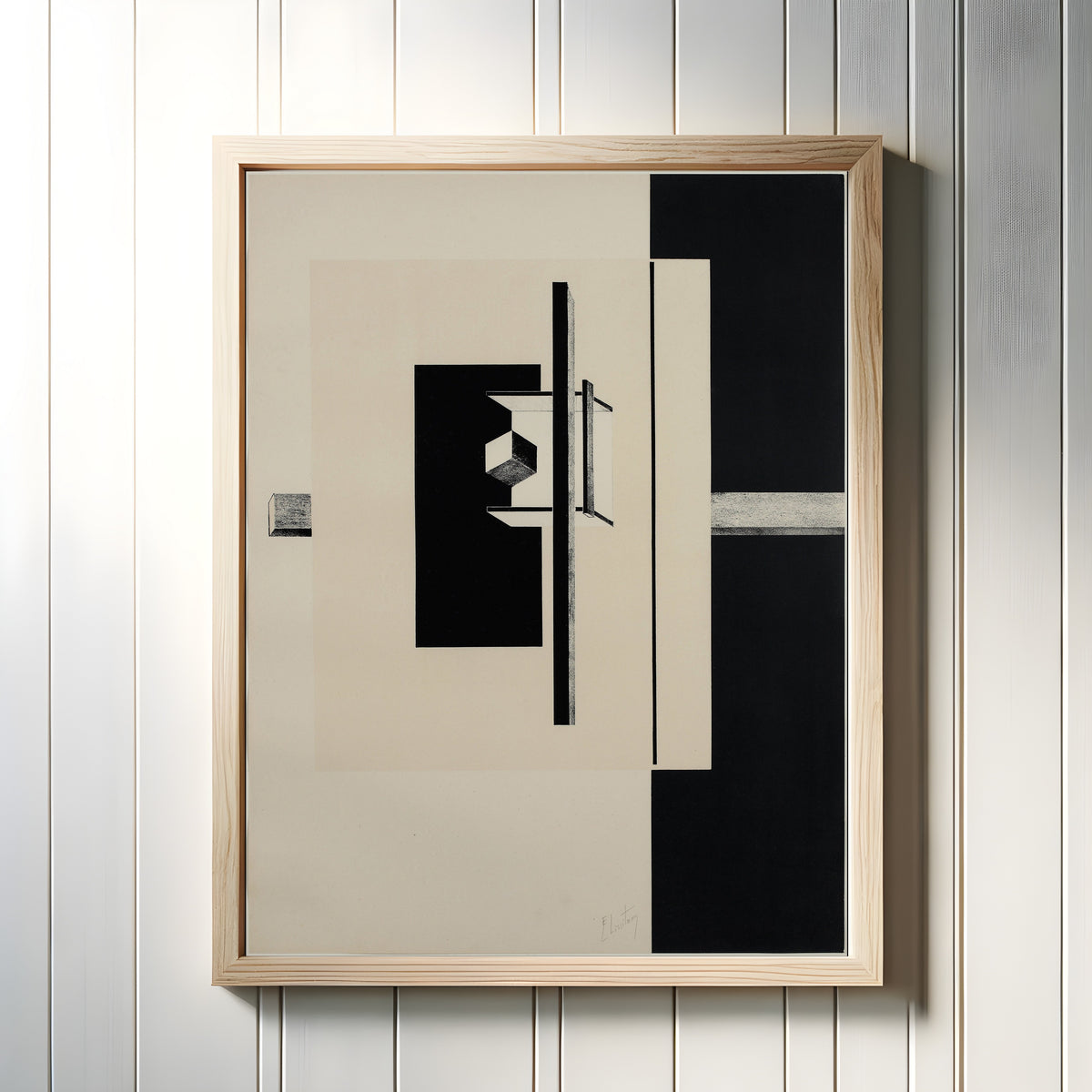 Framed art print of Proun Portfolio: Black Band and Cube by El Lissitzky, in a light wood frame on a white panelled wall