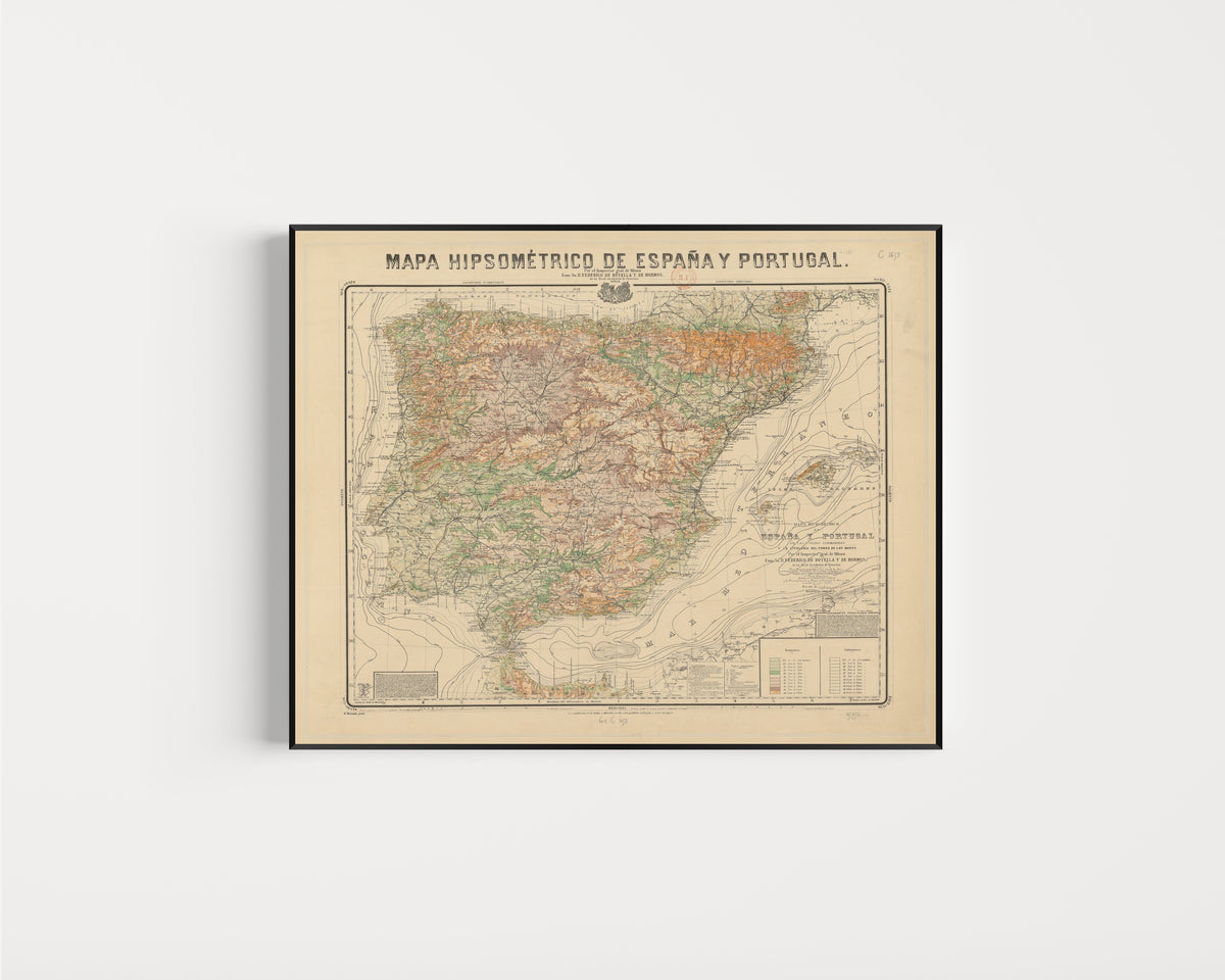 Framed art print of Mapa hipsométrico de España y Portugal by Federico de Botella y de Hornos, in a slim black frame on a plain white wall