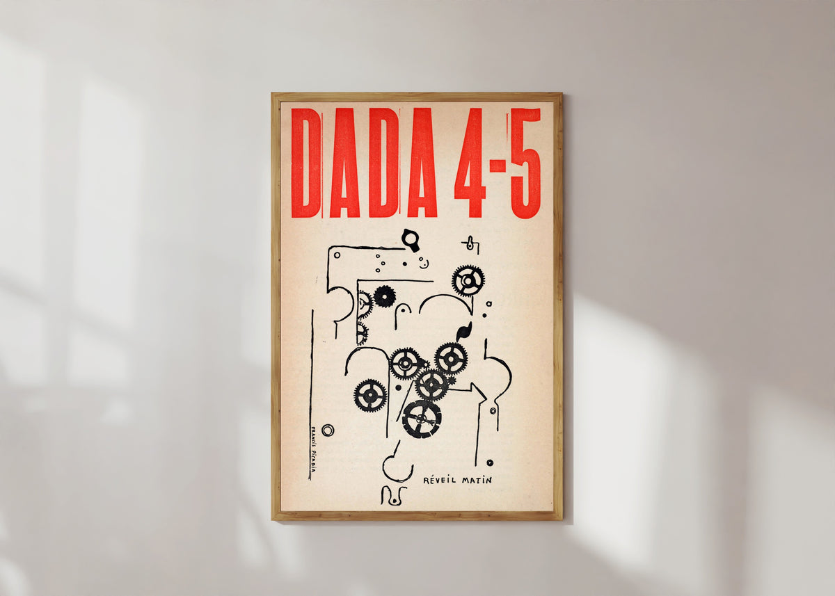 Framed art print of Da-da 4-5 by Francis Picabia, in a light wood frame on a sunlit white wall