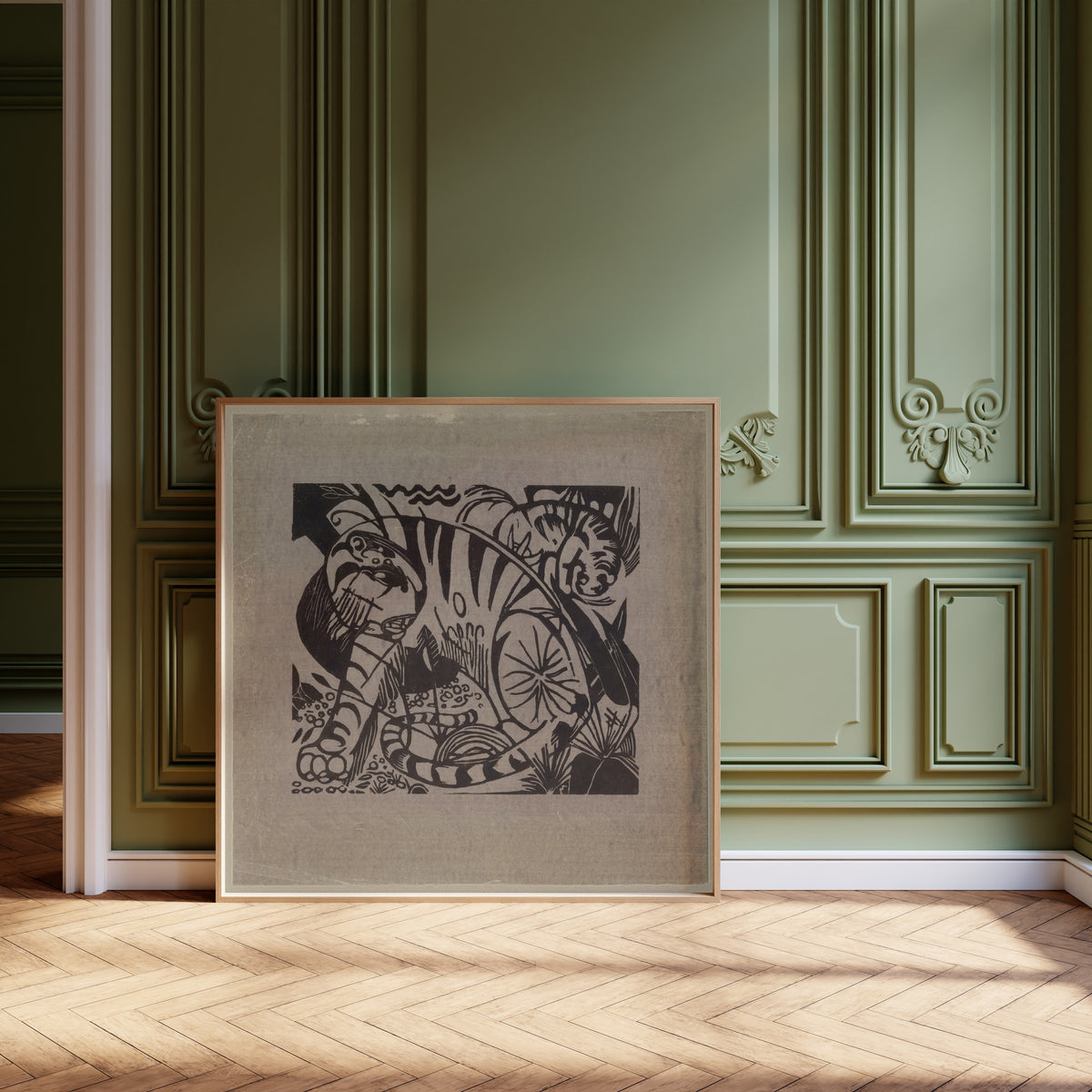 Tiger (Woodcut) by Franz Marc — framed and leaning against olive-green panelling on a herringbone floor