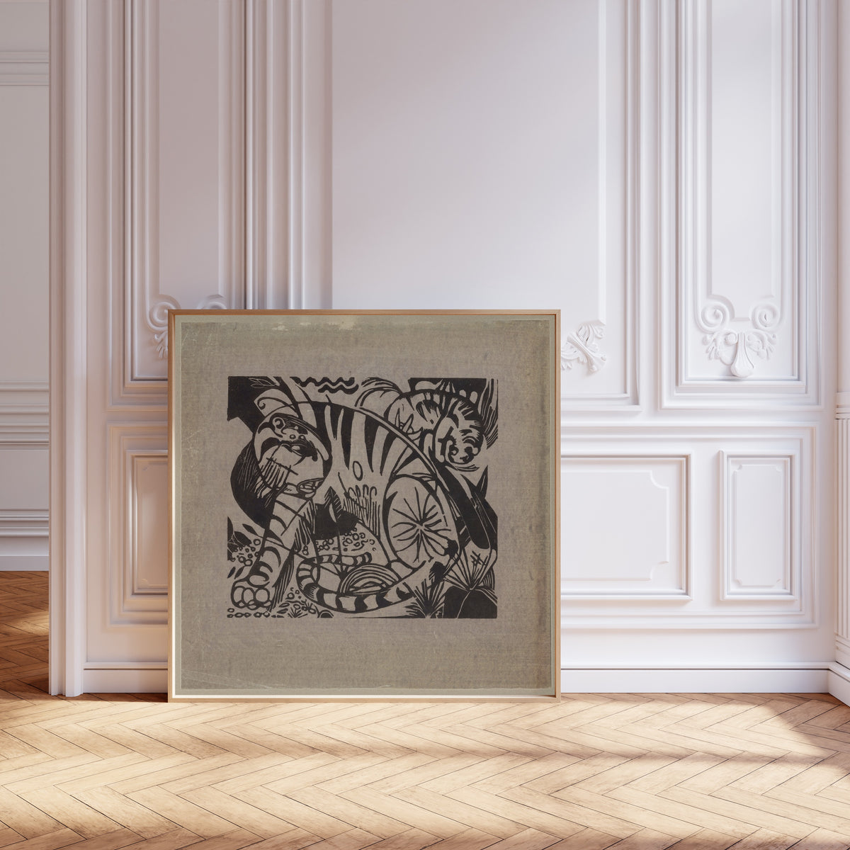 Tiger (Woodcut) by Franz Marc — framed and leaning against pale pink panelling on a herringbone floor