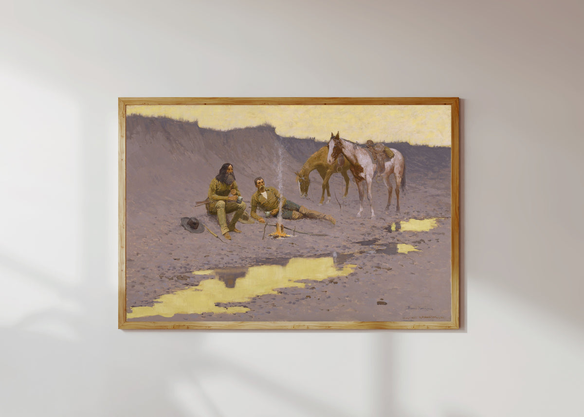 Framed art print of A New Year on the Cimarron by Frederic Remington, in a light wood frame on a sunlit white wall