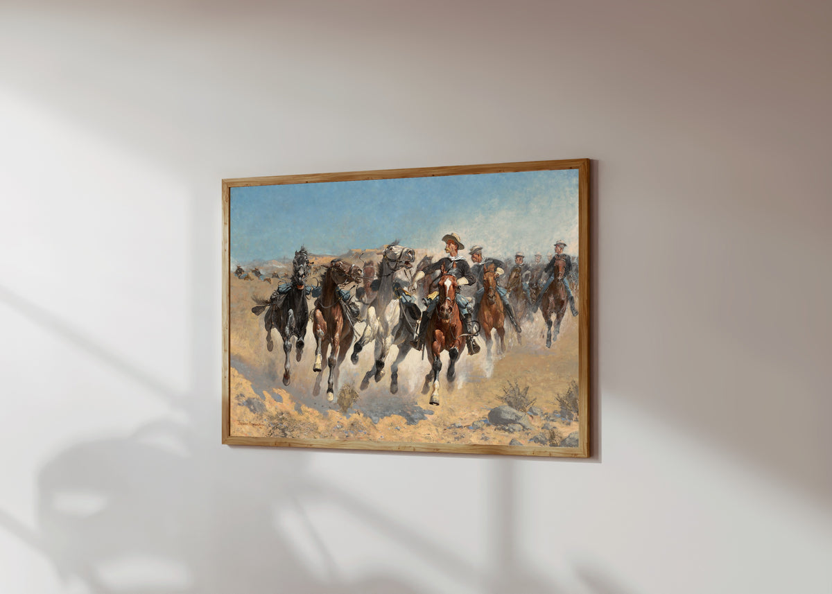 Framed art print of Dismounted: The Fourth Troopers Moving the Led… by Frederic Remington, in a light wood frame on a sunlit white wall, seen at a slight angle