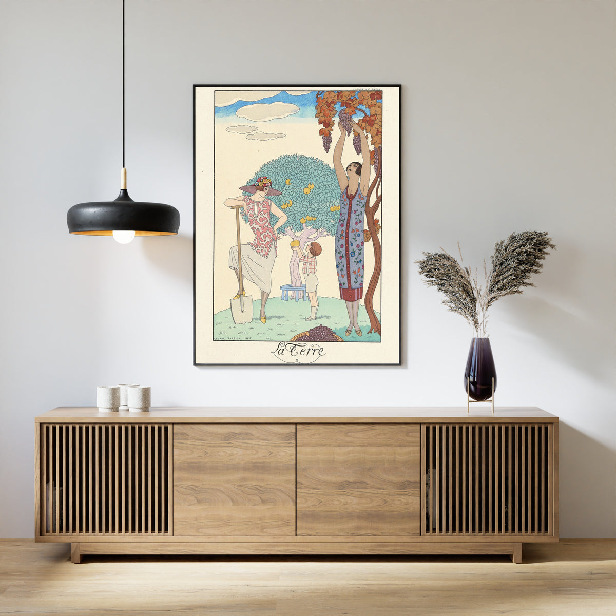 La Terre by George Barbier — framed above a slatted wood sideboard