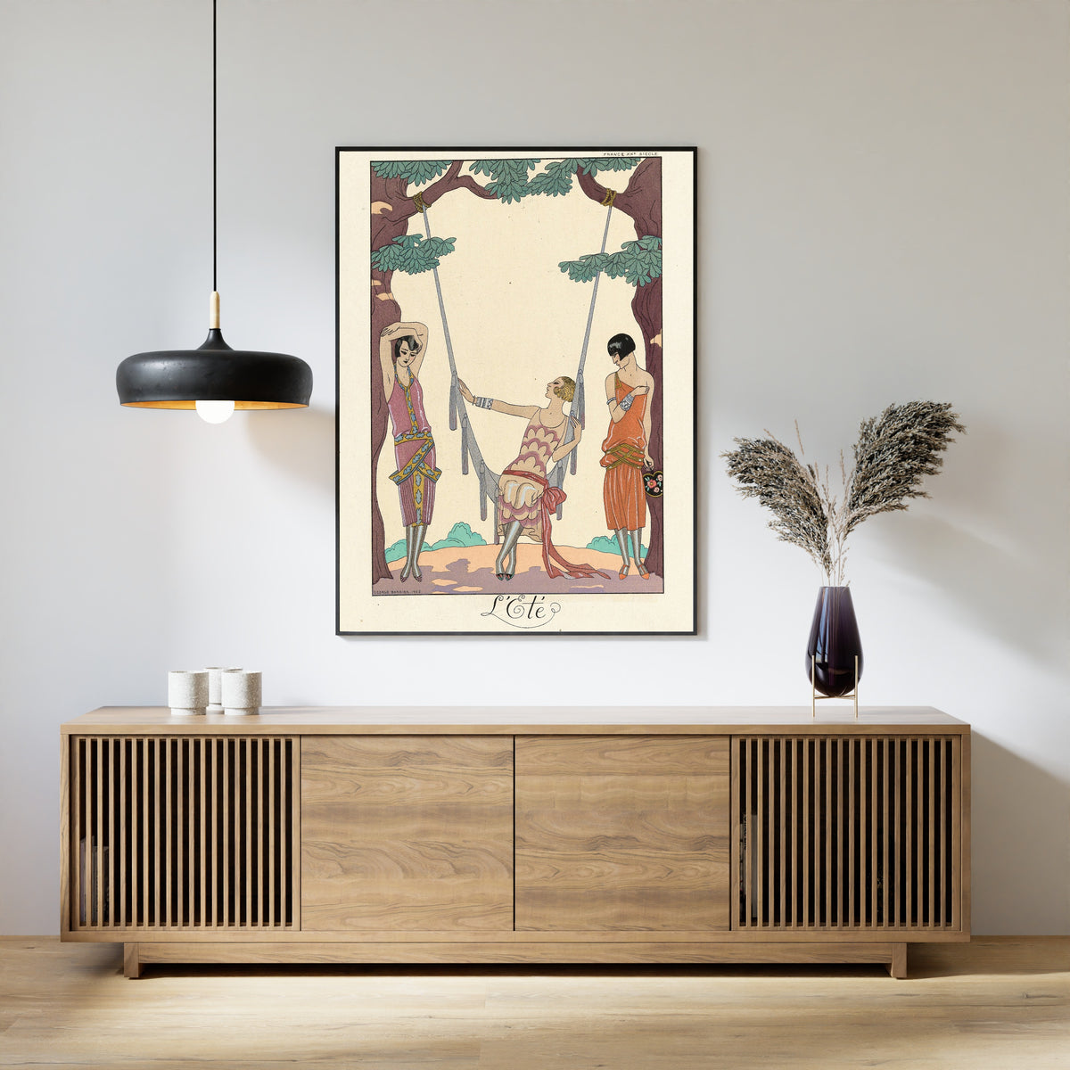 L'Été by George Barbier — framed above a slatted wood sideboard