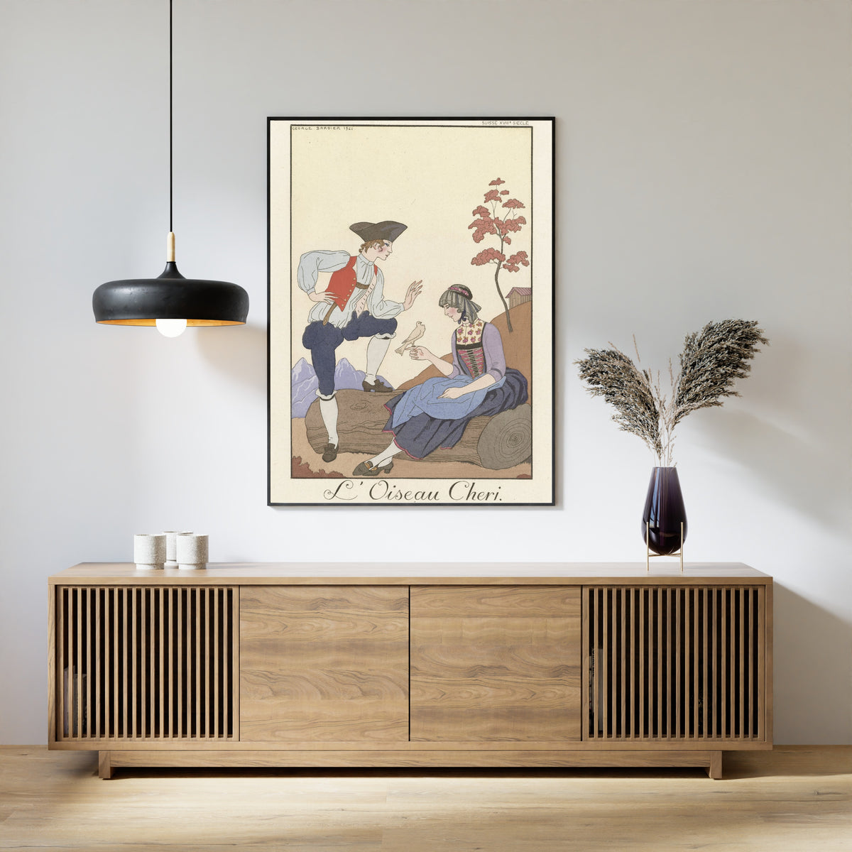 L'Oiseau Chéri by George Barbier — framed above a slatted wood sideboard