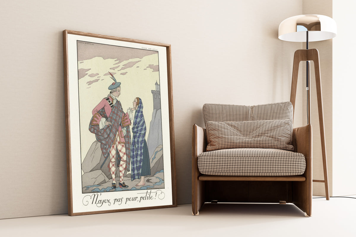 N'ayez pas peur, petite! by George Barbier — framed and leaning against a wall beside an armchair and a floor lamp