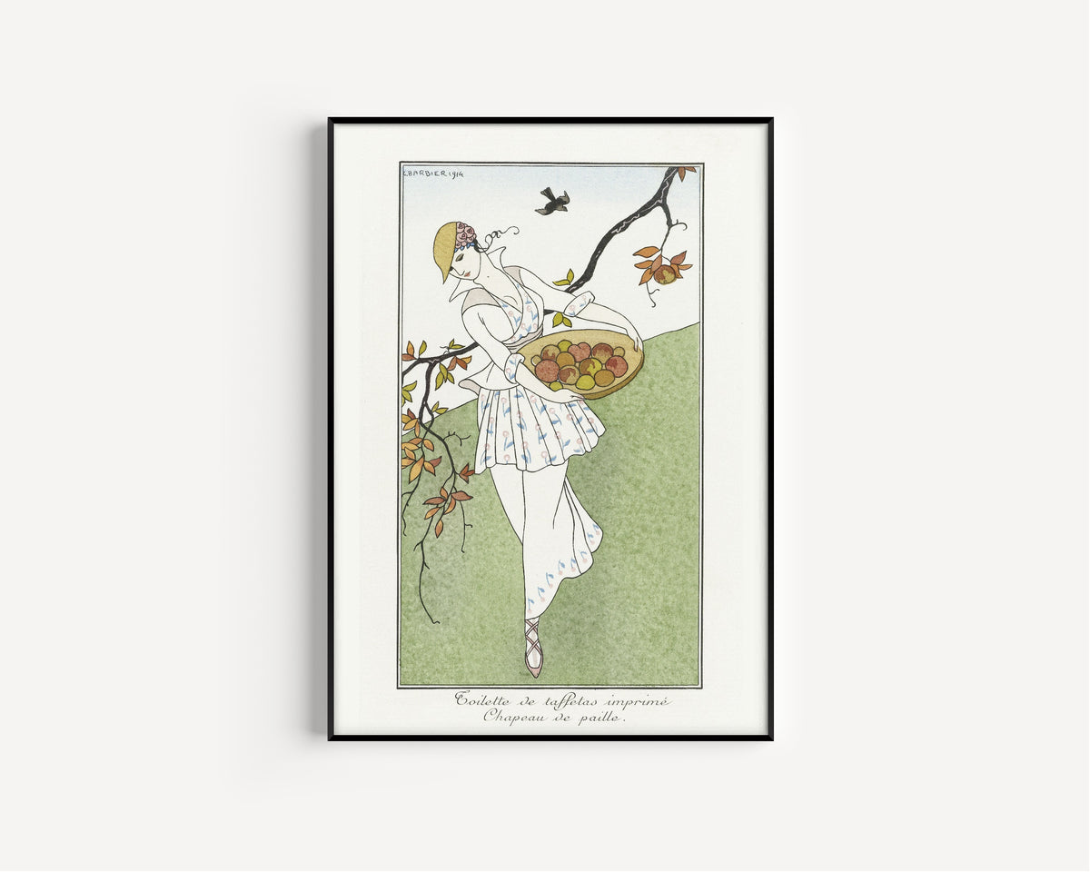 Toilette de taffetas imprimé, Chapeau de paille [Printed taffeta dress, straw hat] by George Barbier — in a slim black frame on a plain white wall