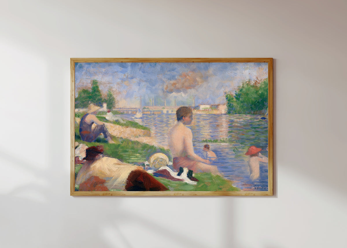 Framed art print of Final Study for Bathers at Asnieres by Georges Seurat, in a light wood frame on a sunlit white wall