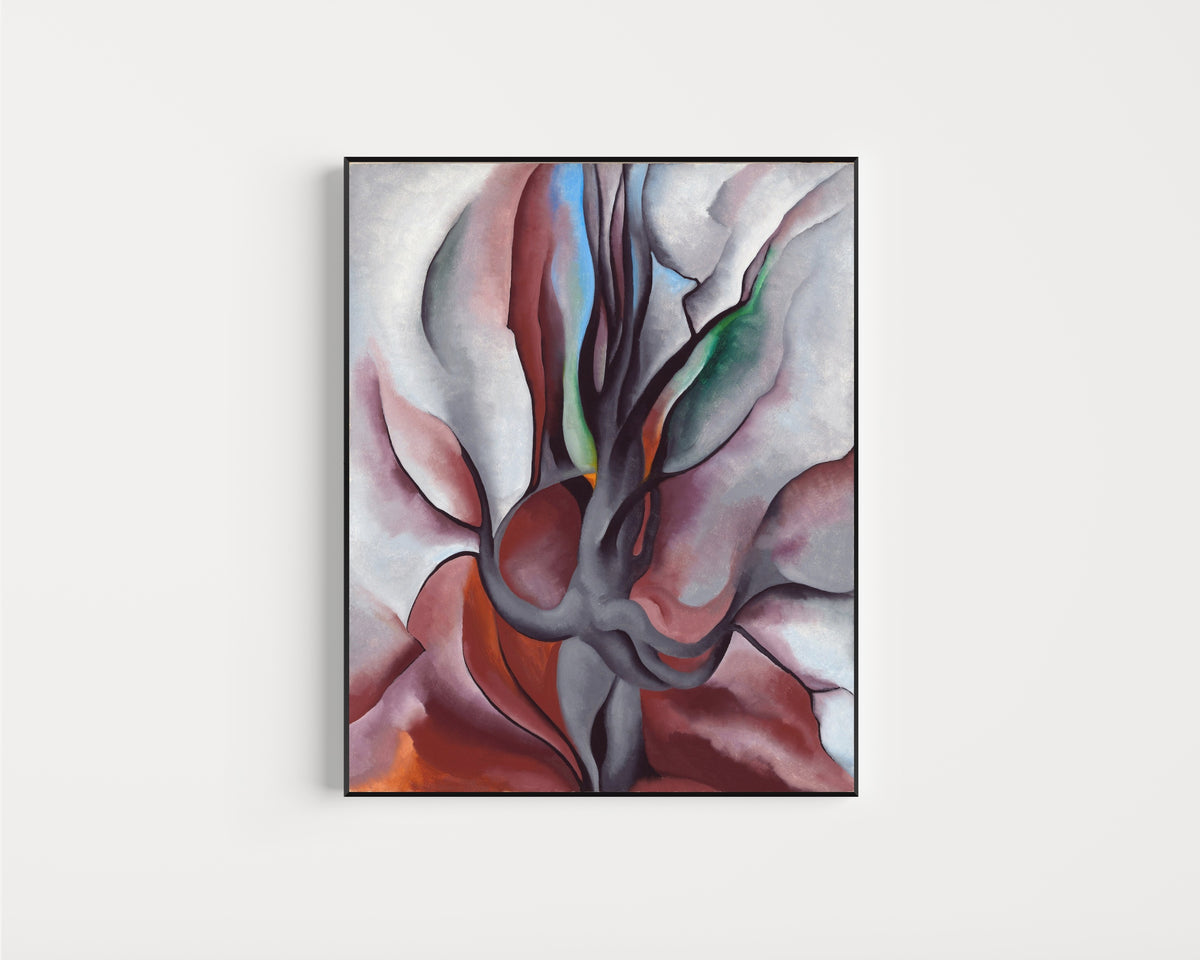 Framed art print of Autumn Trees by Georgia O'Keeffe, in a slim black frame on a plain white wall