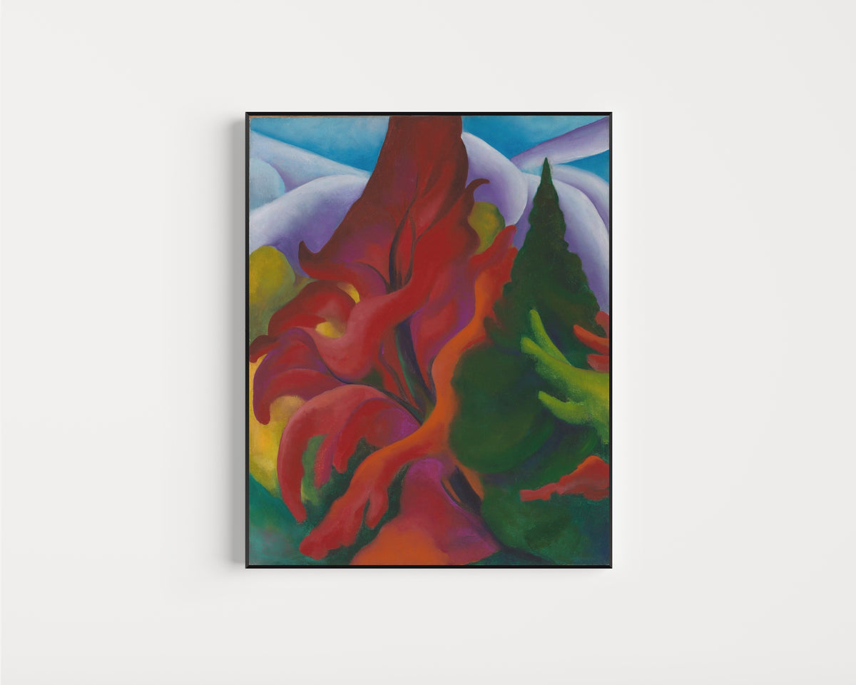 Framed art print of Trees in Autumn by Georgia O'Keeffe, in a slim black frame on a plain white wall