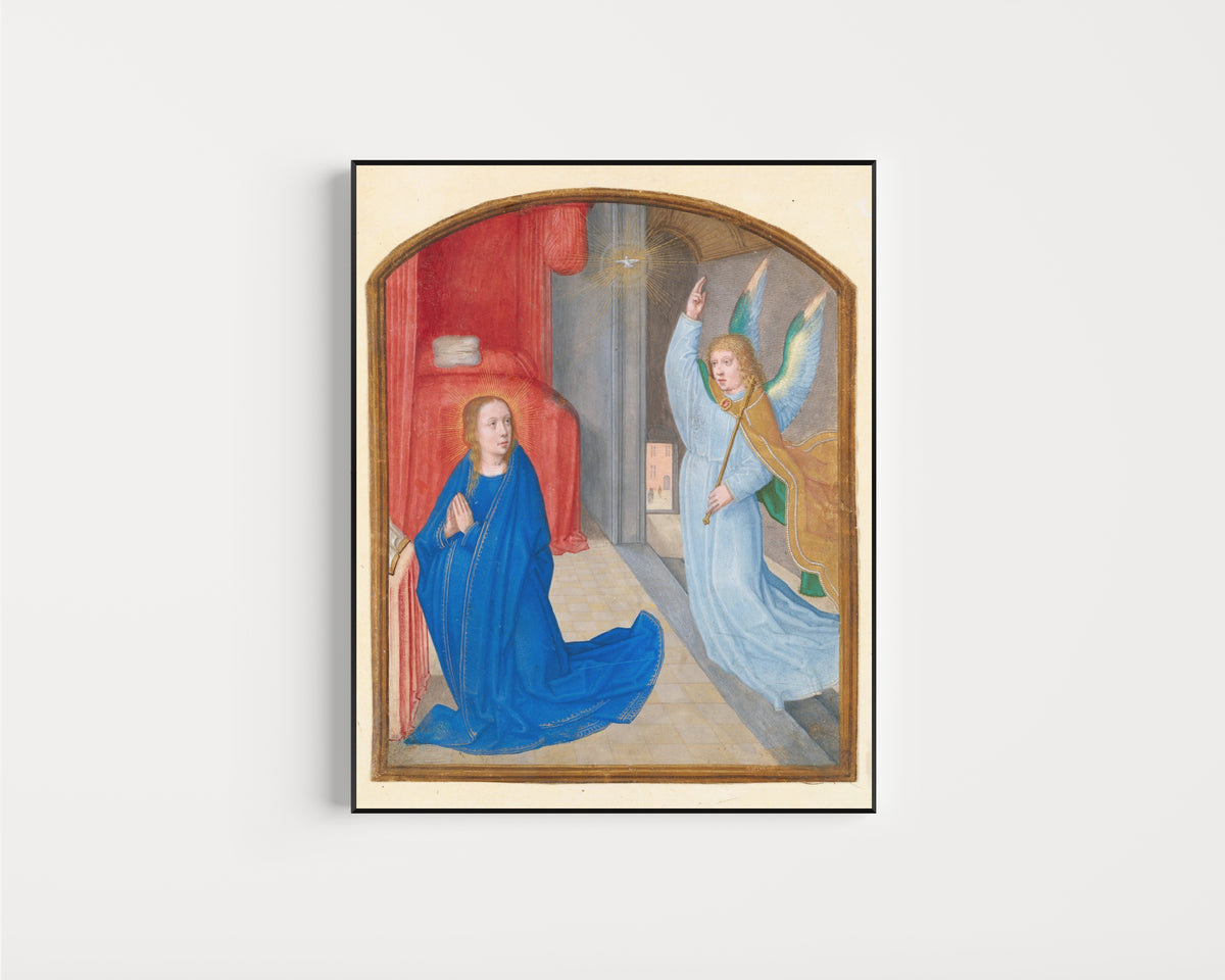 Framed art print of The Annunciation by Gerard David (circle of), in a slim black frame on a plain white wall