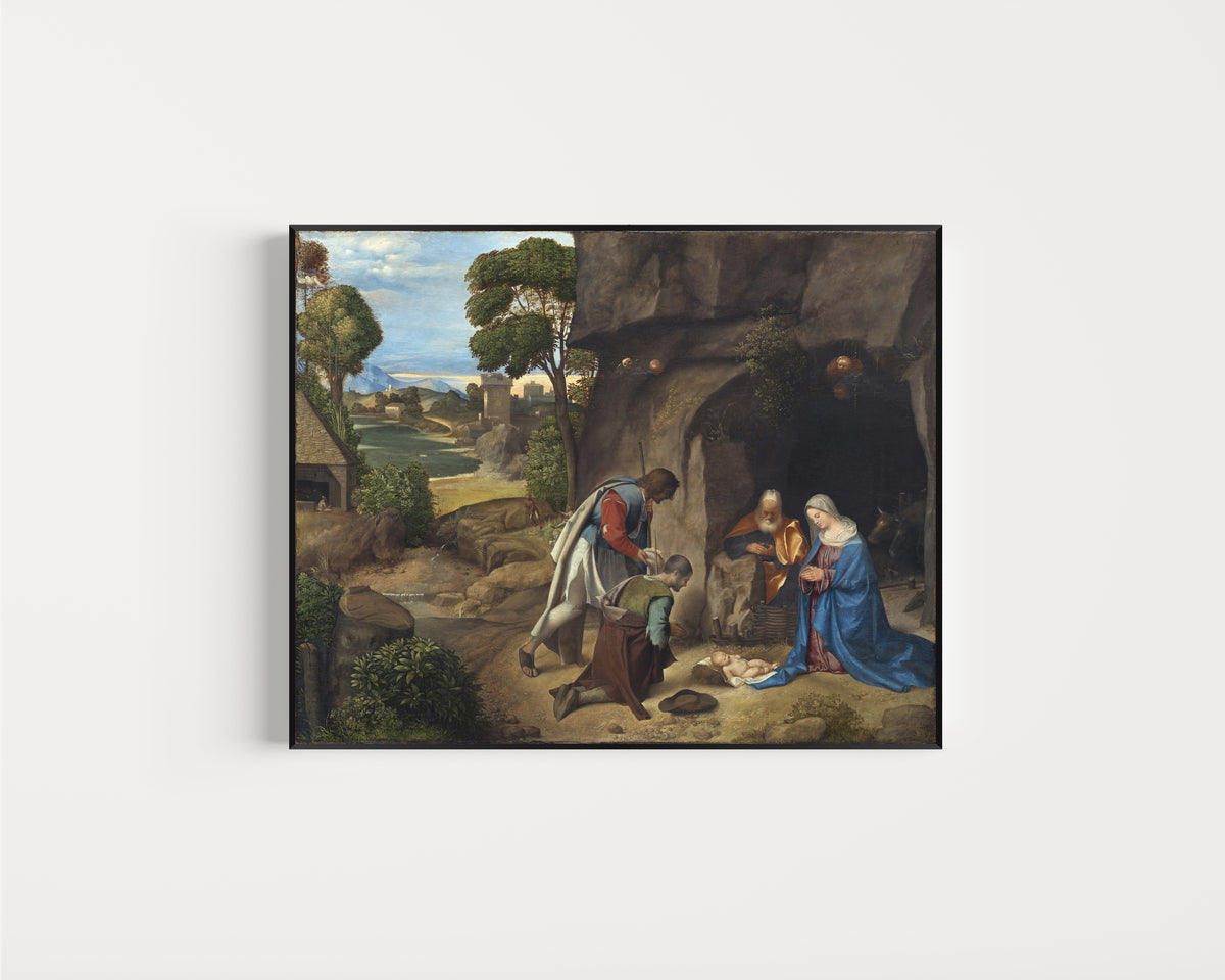Framed art print of The Adoration of the Shepherds by Giorgione, in a slim black frame on a plain white wall