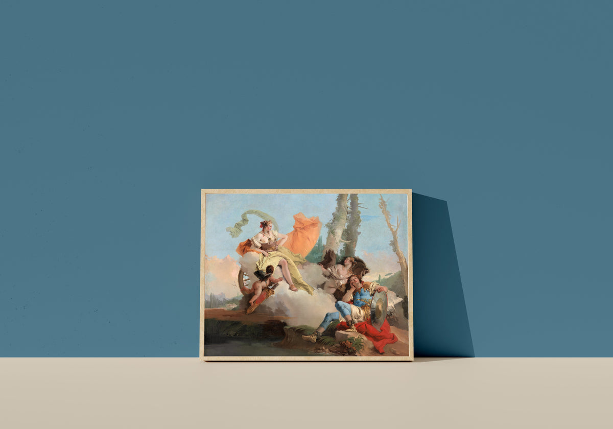 Framed art print of Armida Encounters the Sleeping Rinaldo by Giovanni Battista Tiepolo, in a light wood frame leaning on a blue wall