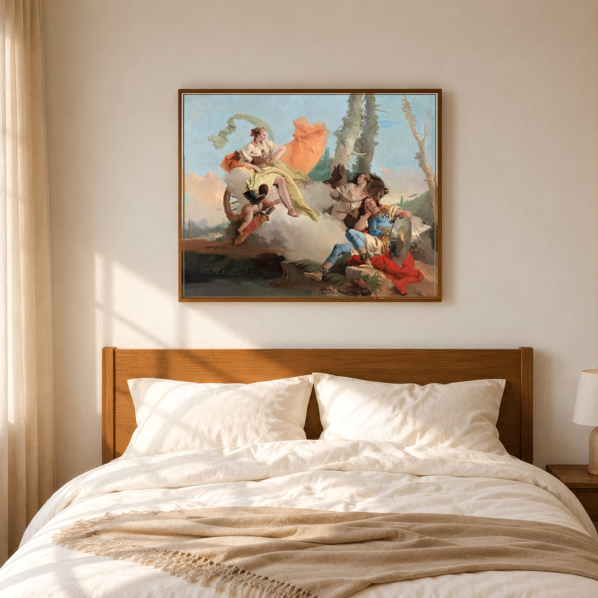 Framed art print of Armida Encounters the Sleeping Rinaldo by Giovanni Battista Tiepolo, in a slim wood frame above a bed in a sunlit bedroom