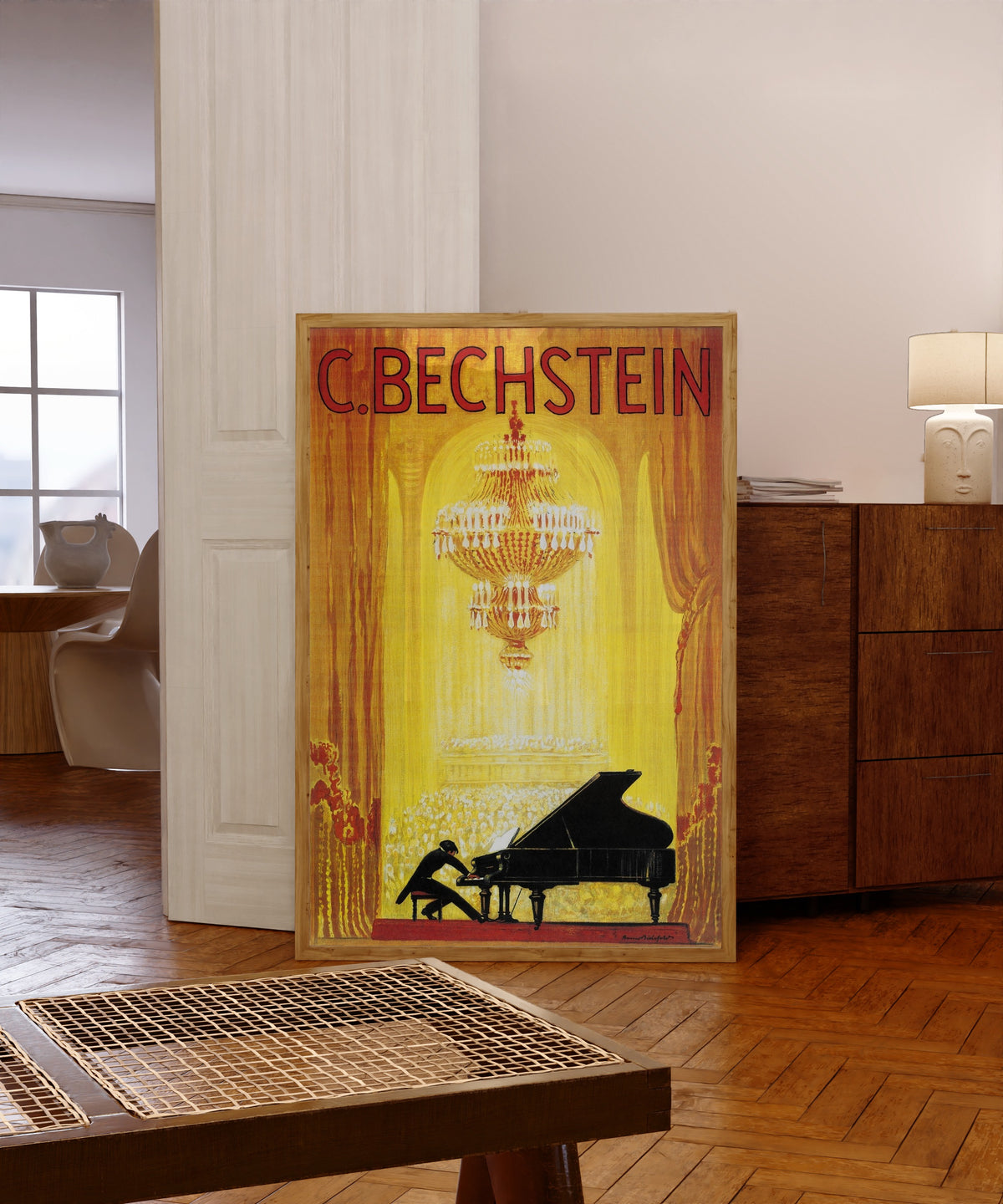 Framed art print of Vintage Art Deco Music Advertising Poster Print, in a light wood frame leaning in a warm room with a parquet floor