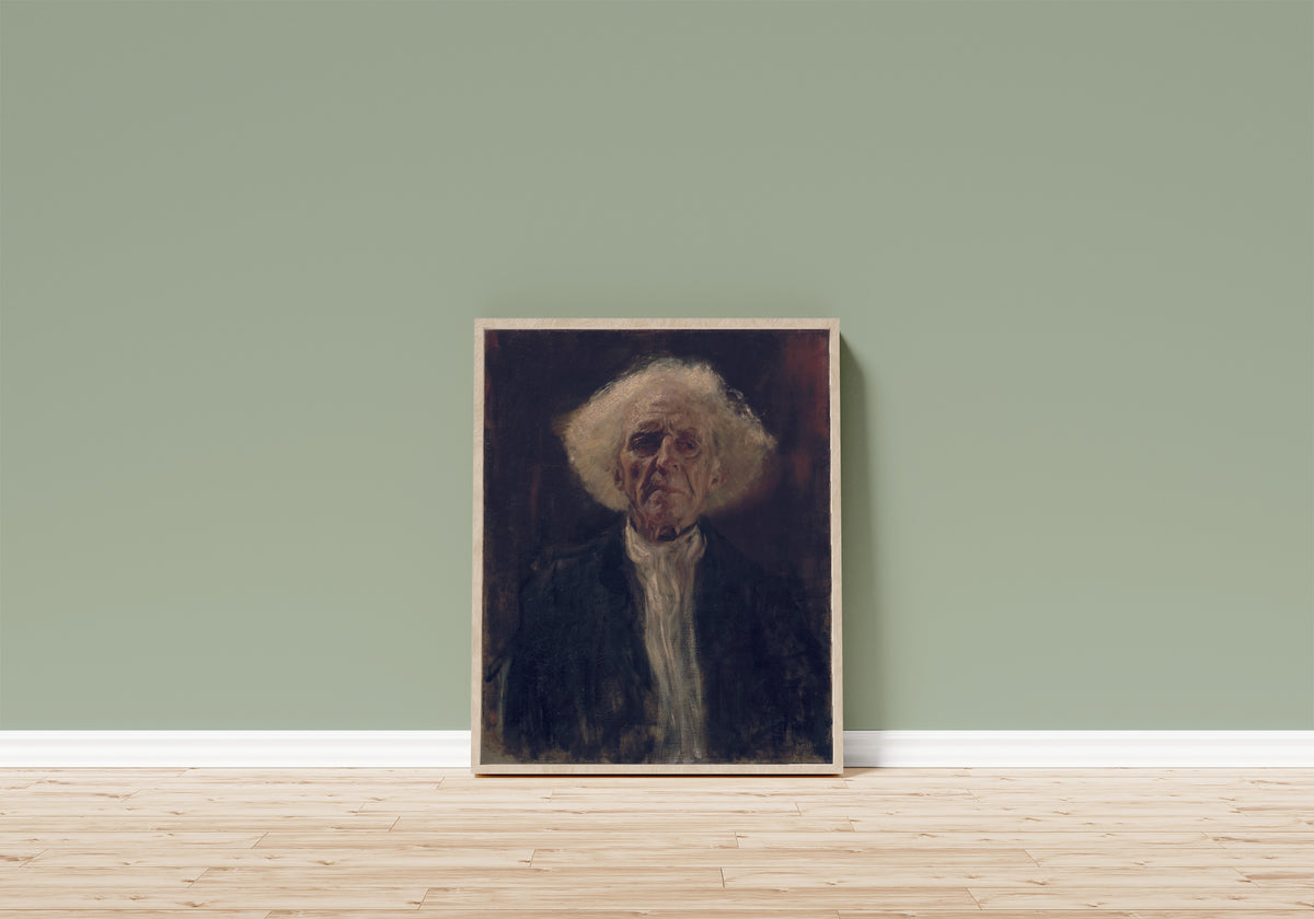 Framed art print of Blind Man by Gustav Klimt, in a light wood frame leaning on a sage green wall above a wooden floor