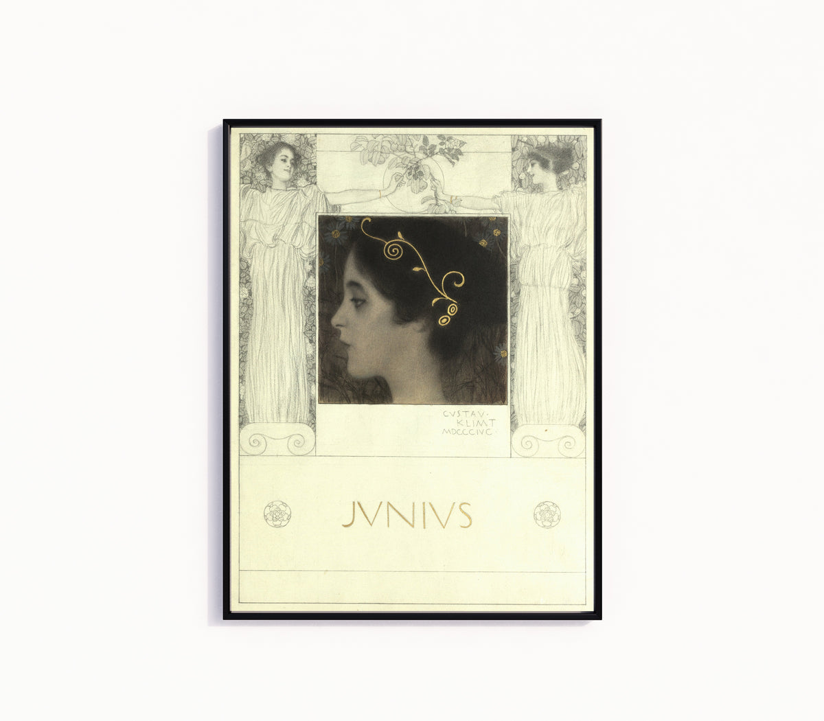 Framed art print of Junius by Gustav Klimt, in a slim black frame on a plain white wall