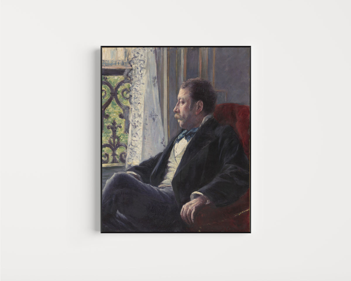 Framed art print of Portrait of a Man by Gustave Caillebotte, in a slim black frame on a plain white wall