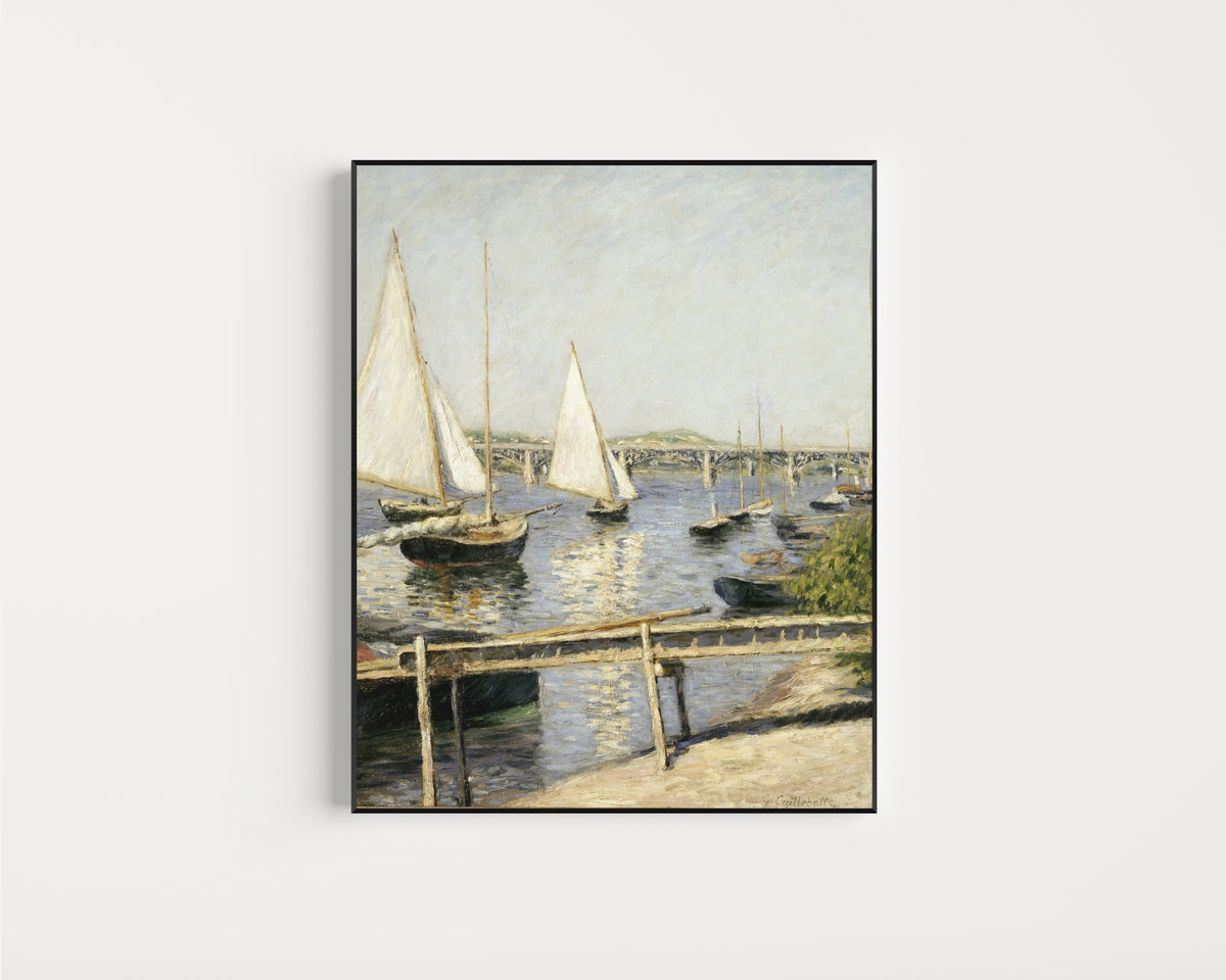 Framed art print of Sailing Boats at Argenteuil by Gustave Caillebotte, in a slim black frame on a plain white wall