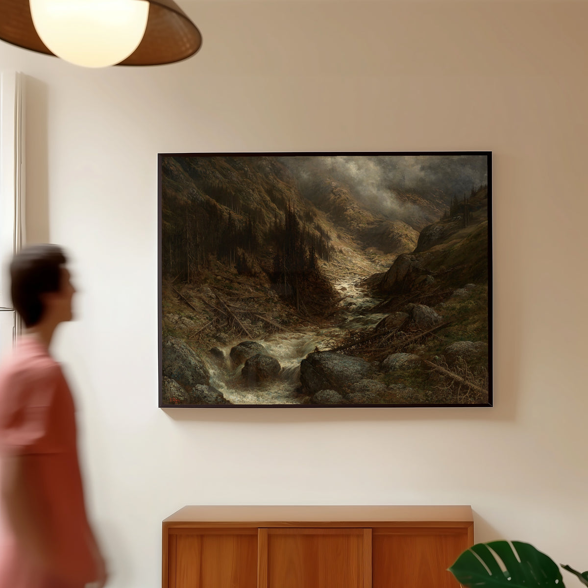 Framed art print of A Torrent in the Engadine by Gustave Doré, in a slim black frame on a warm wall in a sunlit room