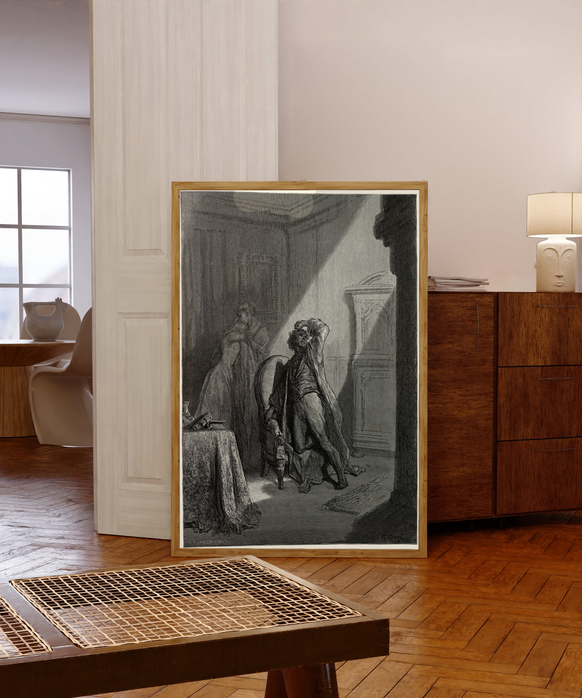 Framed art print of Be that word our sign of parting, bird or fiend! by Gustave Doré, in a light wood frame leaning in a warm room with a parquet floor