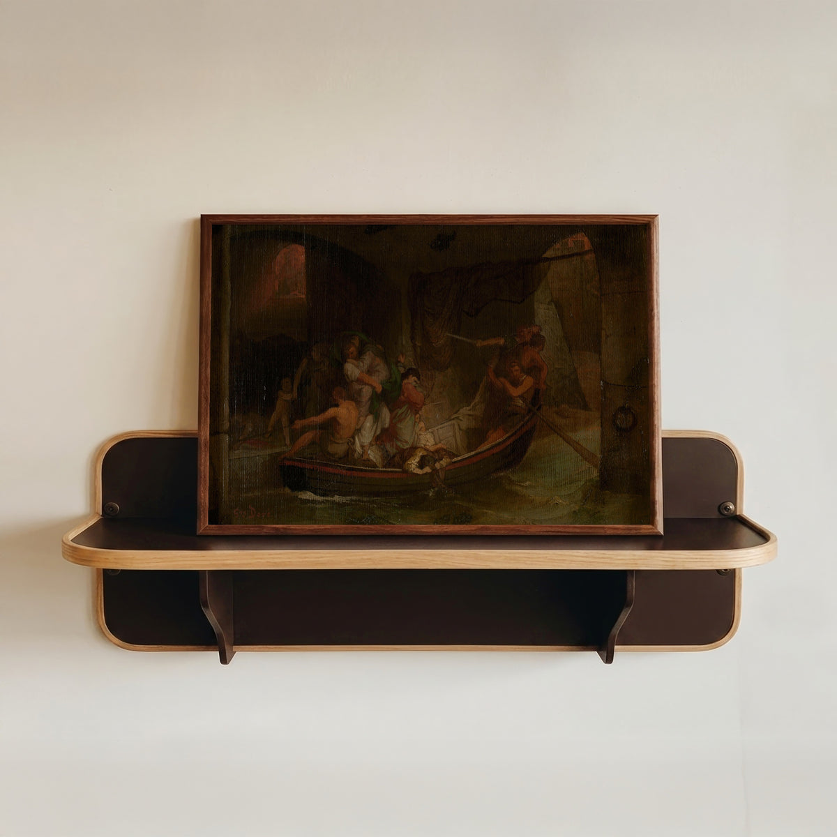 Framed art print of Fire of Rome by Gustave Doré, in a dark wood frame resting on a wall shelf