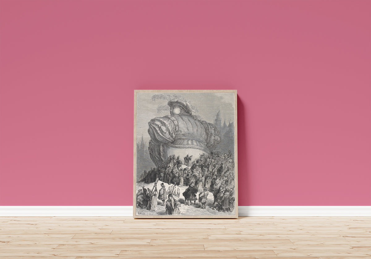 Framed art print of Gargantua's Welcome to Paris by Gustave Doré, in a light wood frame leaning on a pink wall above a wooden floor