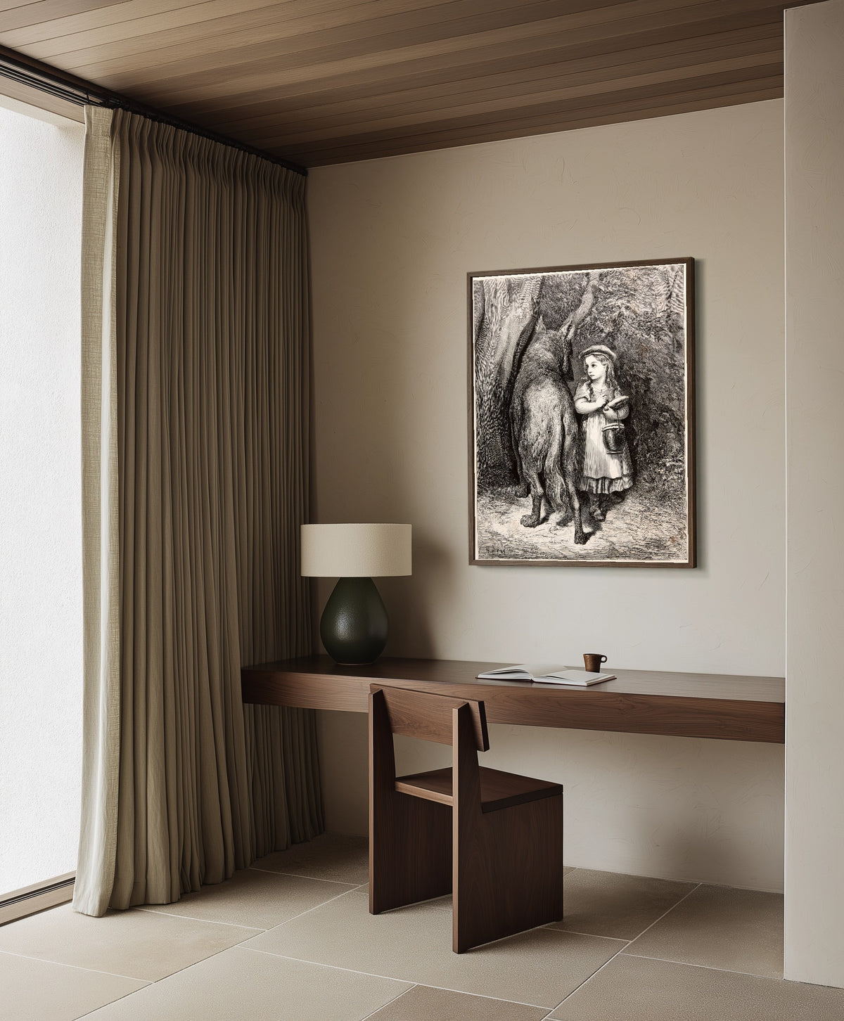 Framed art print of Little Red Riding Hood: Meeting the Wolf by Gustave Doré, in a dark wood frame on a plaster wall above a walnut desk
