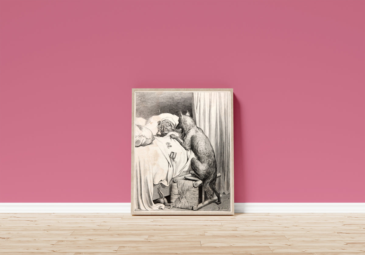 Framed art print of Little Red Riding Hood: The Wolf at Grandmother's Bed by Gustave Doré, in a light wood frame leaning on a pink wall above a wooden floor