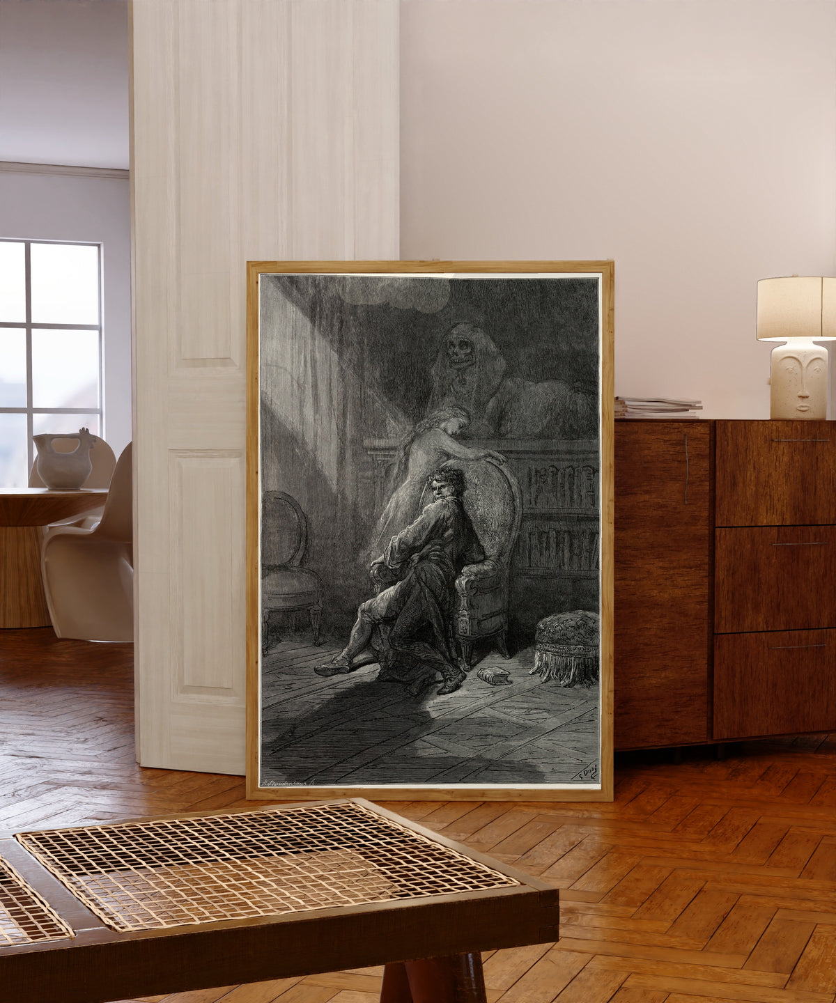 Framed art print of On this home by Horror haunted by Gustave Doré, in a light wood frame leaning in a warm room with a parquet floor