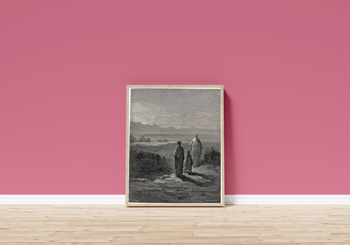 Framed art print of Purgatorio, Canto I: Cato on the Shore by Gustave Doré, in a light wood frame leaning on a pink wall above a wooden floor